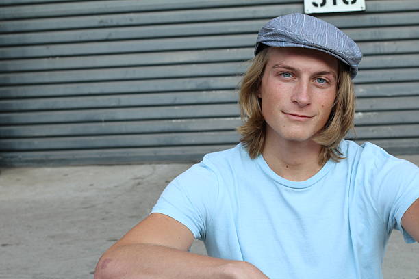 istock Smiley Caucasian man in newsboy hat 637099798