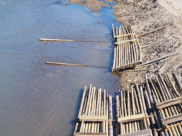 istock Group of bamboo raft in the river 637104920