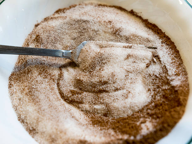 istock Small Bowl of Cinnamon and Sugar Mix for Cinnamon Rolls 637106072