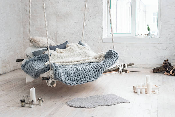 istock White loft interior in classic scandinavian style. Hanging bed suspended 637106662
