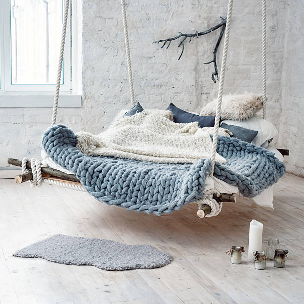 istock White loft interior in classic scandinavian style. Hanging bed suspended 637106704