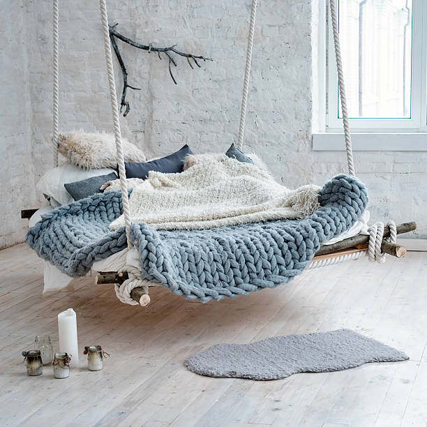 istock White loft interior in classic scandinavian style. Hanging bed suspended 637106772