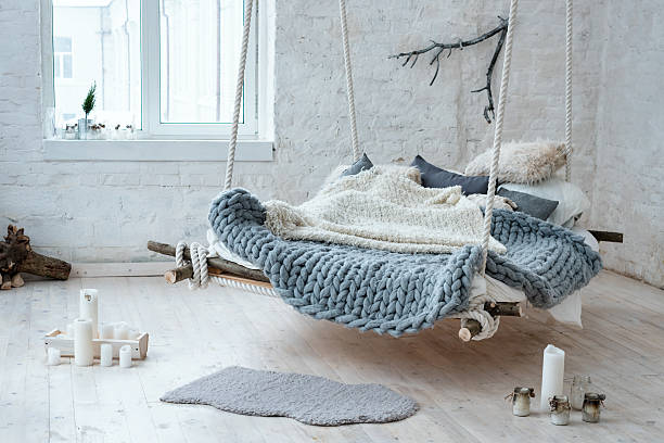 istock White loft interior in classic scandinavian style. Hanging bed suspended 637106890