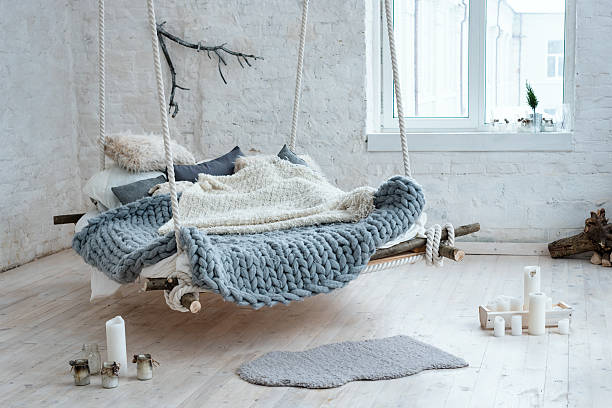 istock White loft interior in classic scandinavian style. Hanging bed suspended 637106966