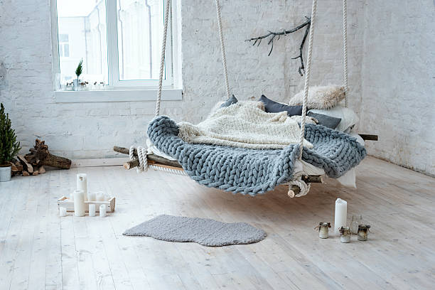 istock White loft interior in classic scandinavian style. Hanging bed suspended 637107040
