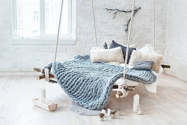istock White loft interior in classic scandinavian style. Hanging bed suspended 637107080