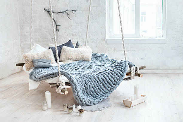 istock White loft interior in classic scandinavian style. Hanging bed suspended 637107138