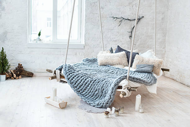 istock White loft interior in classic scandinavian style. Hanging bed suspended 637107254