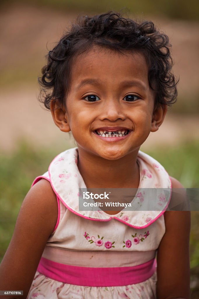 Portrait of smile asian poor girl in Thailand Asia Stock Photo