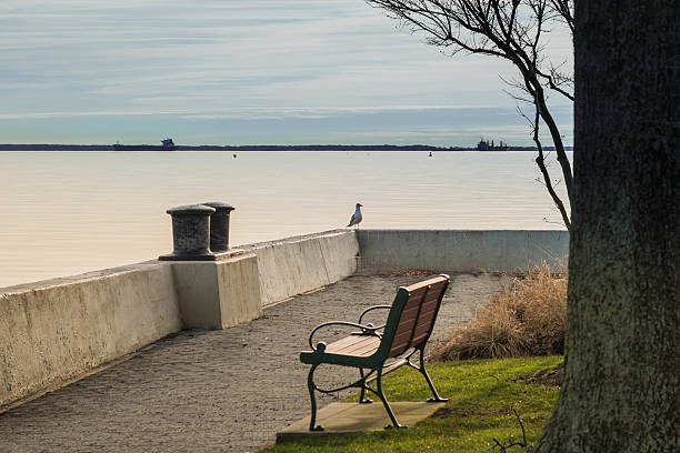 istock Morning scene of the bay, sky, a bench 637110698