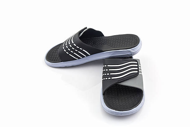 istock Sandals shoes. Black color flip flops. 637112494