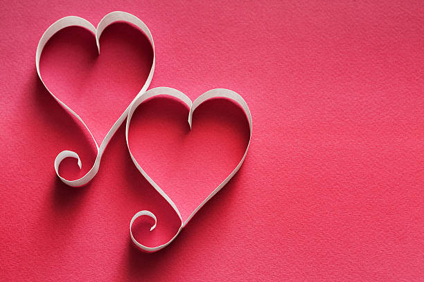 istock Valentine day background, handmade paper hearts on red 637112802