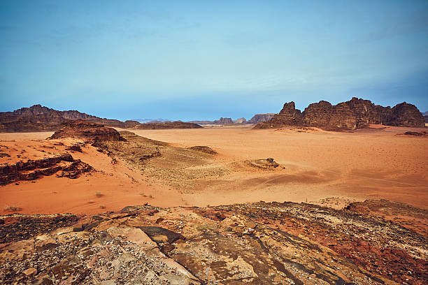 istock Amazing landscape with red rocks in Wadi Rum desert 637113382