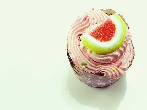 cupcakes on white background filtered image processed vintage effect