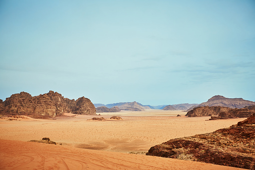 Amazing panorama with red rocks and sand in Wadi Rum desert in Arabia