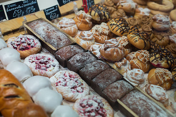 istock Modern bakery with assortment of bread, cakes and buns 637115124