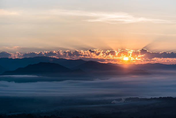 istock panorama of mountain  with sun and fog 637117372