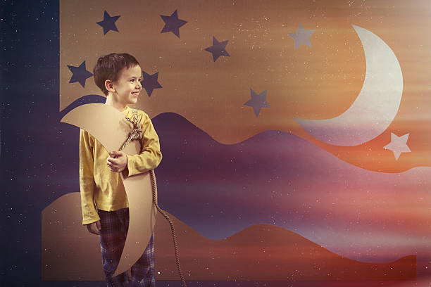 istock Boy keeping the paper moon 637119638