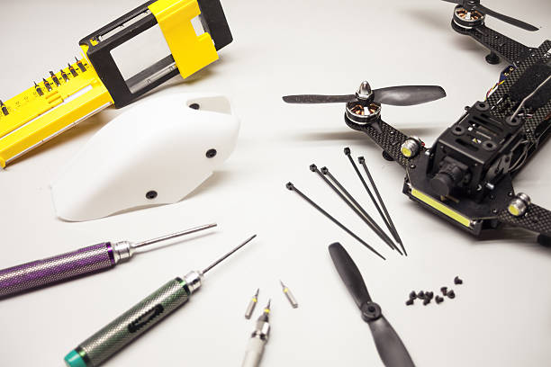 istock Repair maintenance drone, screws, screwdriver, tools 637120126