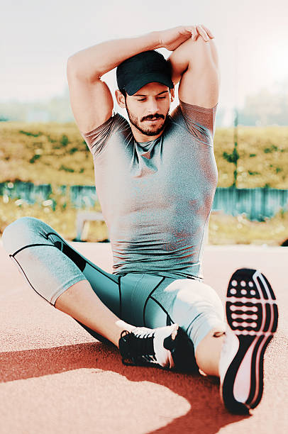 istock Runner stretching his body after training. Sport concept 637120640