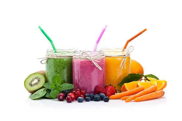 smoothies de frutas misturadas - healthy eating fruit drink juice - fotografias e filmes do acervo
