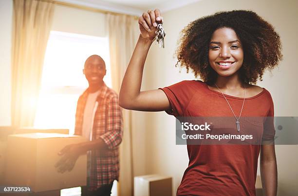 Were Finally The Owners Of Our Dream House Stock Photo - Download Image Now - Key, Holding, Women