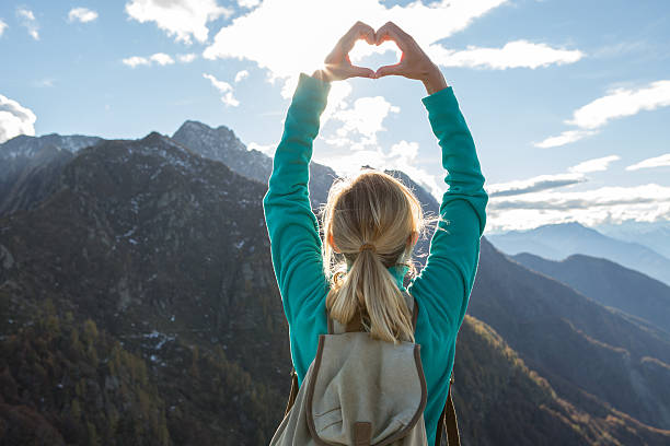 istock Hiker on mountain top loving nature 637125474