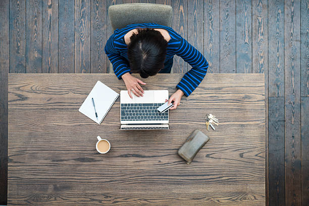 istock Woman working at home with a laptop 637128254