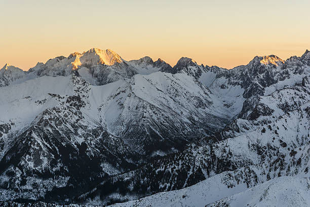 istock The sun illuminates the peaks. 637128348