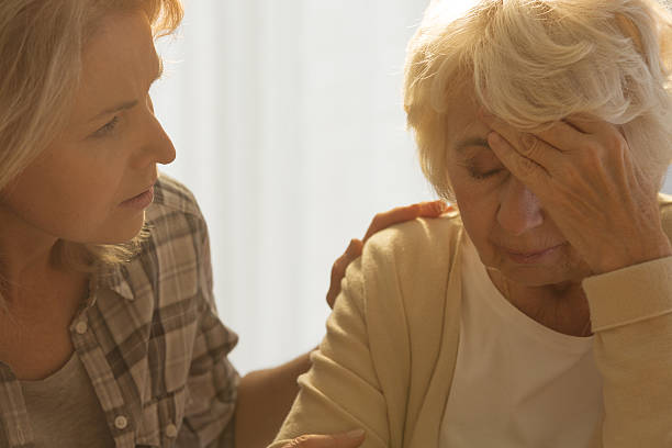 istock Ill senior and worried daughter 637128374