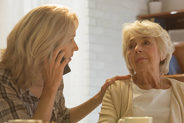 istock Woman calling doctor 637128394