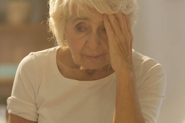 istock Worried ill senior woman 637128510