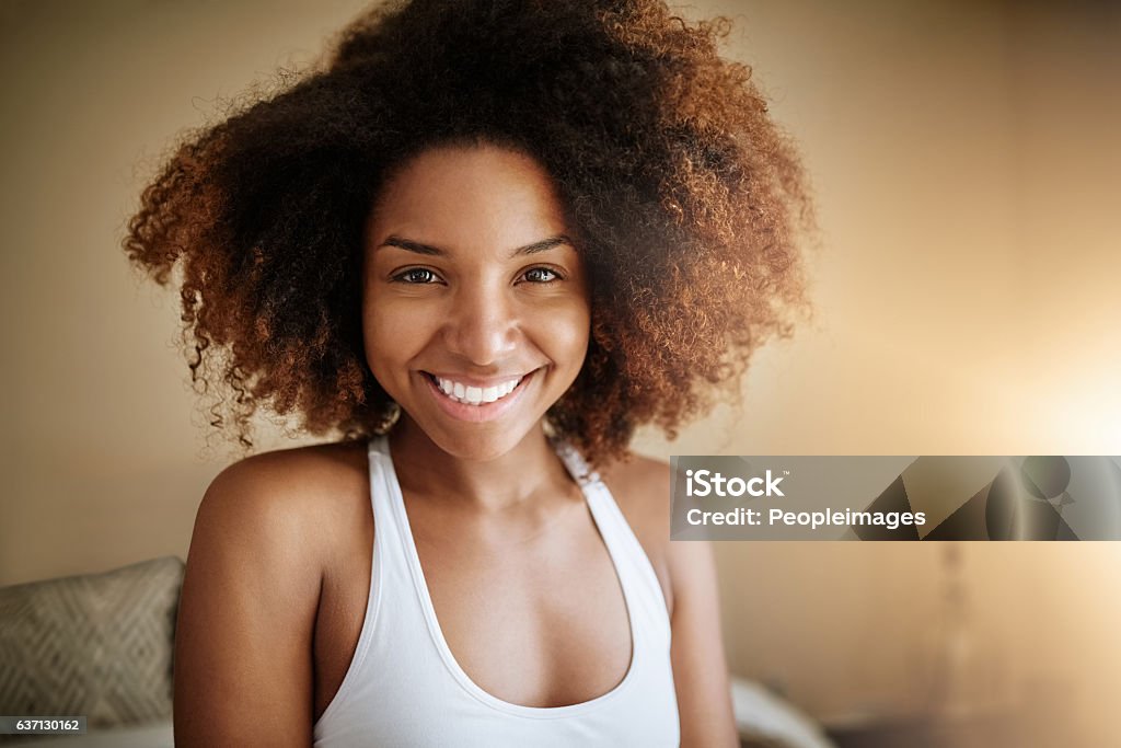 Choose happiness every morning Portrait of a happy young woman enjoying her morning routine at home 20-29 Years Stock Photo