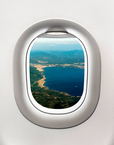 istock View of sea bay from airplane window 637132018