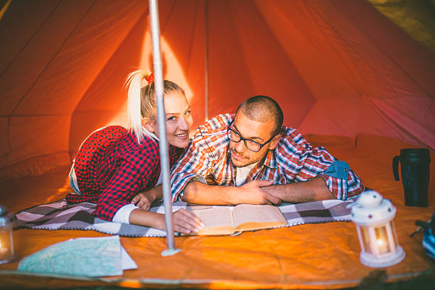 istock couple camping together 637133460
