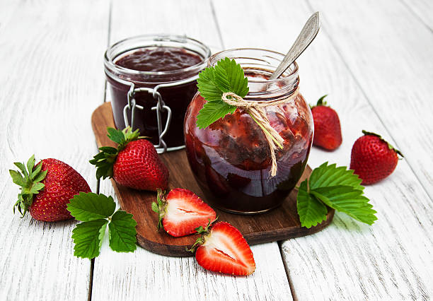 istock Strawberry jam and fresh strawberries 637135256