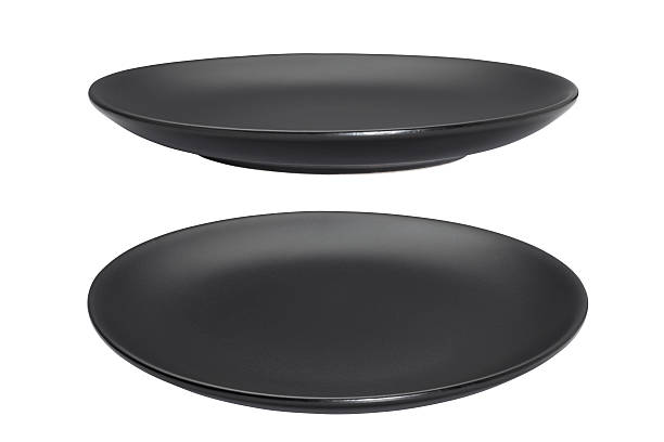 empty plate Black empty plate isolated on white background empty plate stock pictures, royalty-free photos & images
