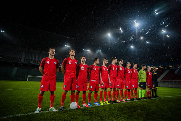 istock Football team in a row 637137796