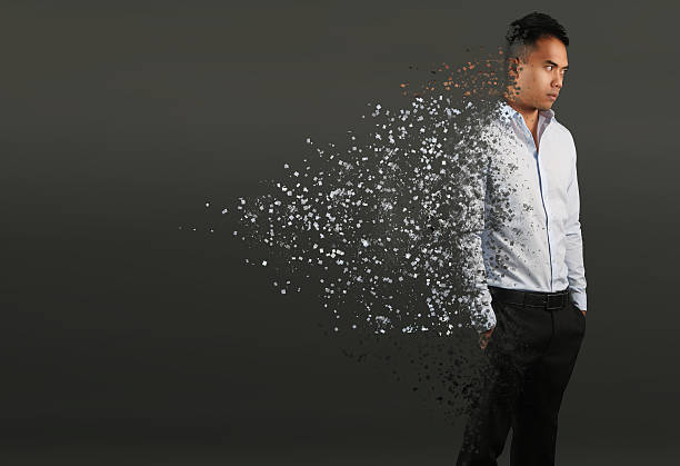 Man with pixel dispersion effect Man with pixel dispersion effect. Disintegration of body  disintegration stock pictures, royalty-free photos & images