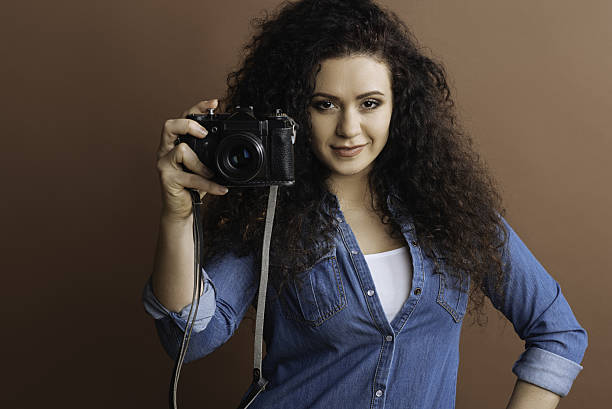 istock Self-confident lady being in the mood for shooting 637148944