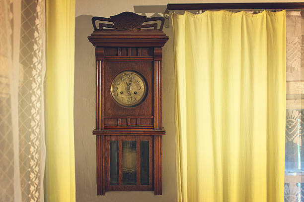 istock The vintage brown wooden wall worn clock 637149348