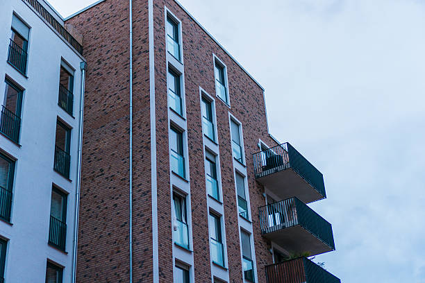 istock modern office or apartment building with brick facade 637149596