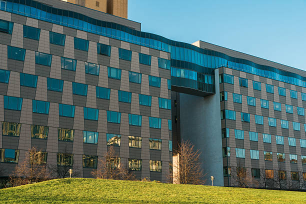 istock modern office building with park in the foreground 637149784