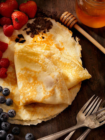 Crepes with Fresh Berries and Chocolate Sauce -Photographed on a Hasselblad H3D11-39 megapixel Camera System