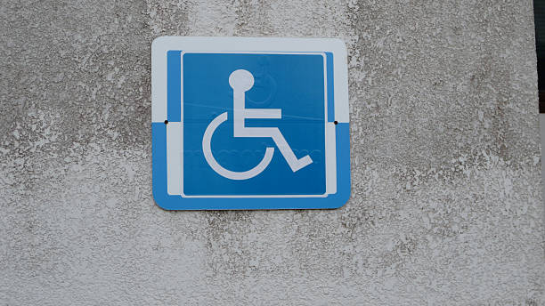 istock sign for disabled on the  wall 637151138