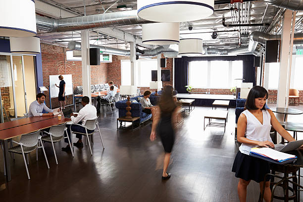 istock Interior Of Busy Design Office With Staff 637152016