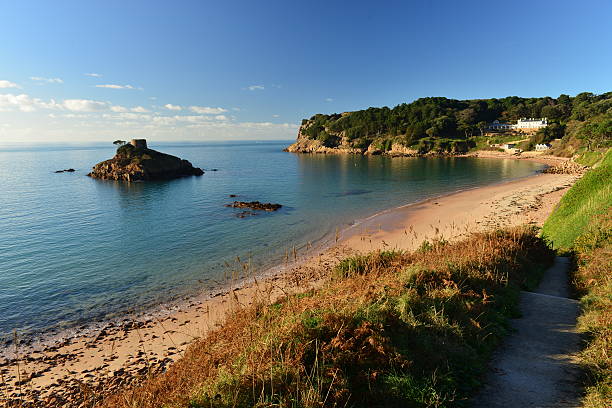 Wide angle image of a picturesque bay in Winter with a high tide.
