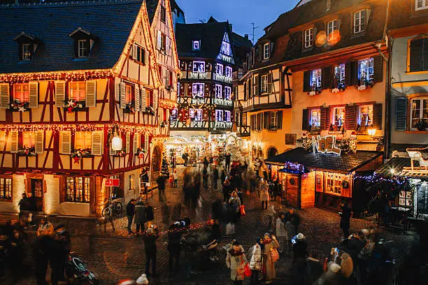 Old town illuminated and decorate like a fairy tale in Christmas festive season in Colmar, Alsace, France
