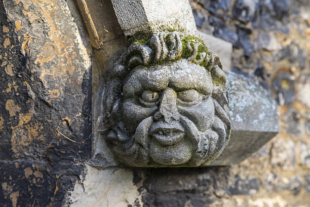 A gargoyle on the exterior of Waltham Abbey Church in Waltham Abbey, Essex.