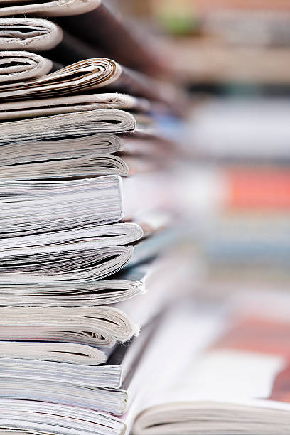 istock Stack of newspaper and magazines with copy space 637158038